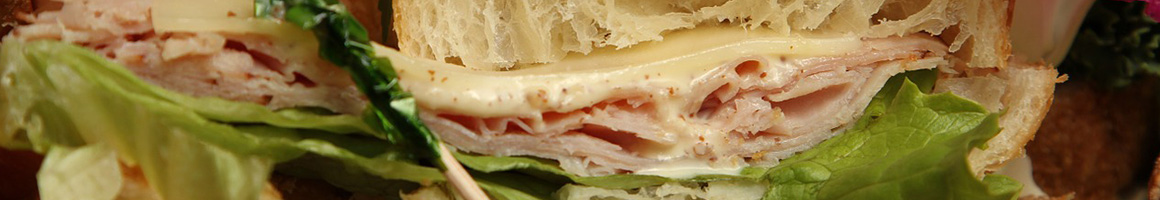 Eating Sandwich at Ba Le Sandwiches restaurant in Denver, CO.